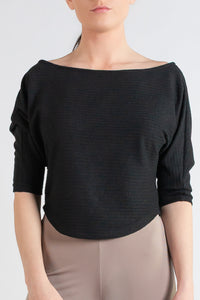 black top with gray pants