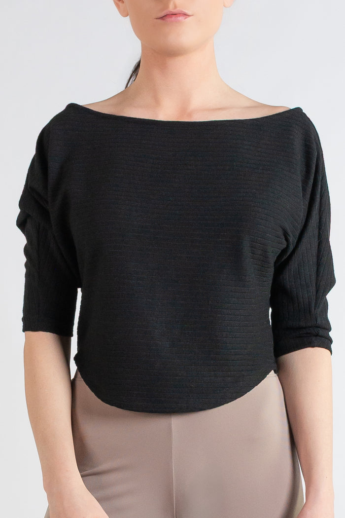 black top with gray pants