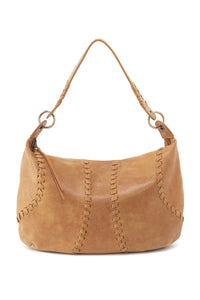 Brown leather handbag with braided handle on a white background