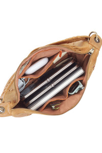 Tan leather pouch with zipper, containing pens and a bottle on a white background