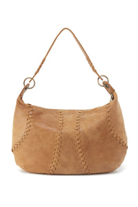 Brown leather handbag with braided handle on a white background