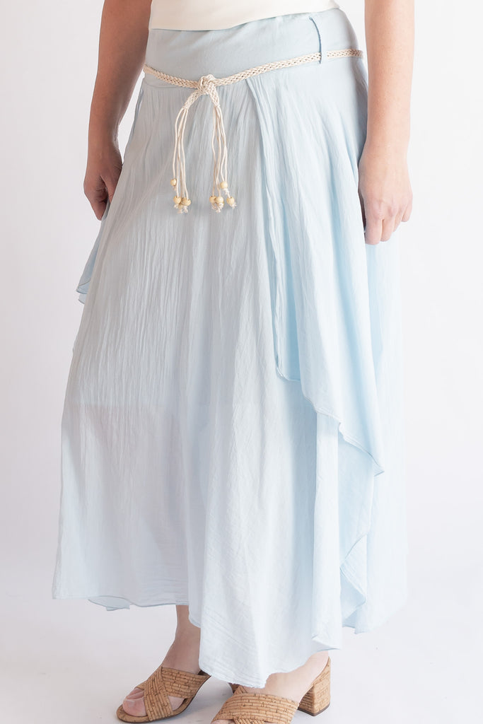 Light blue skirt with a belt on a white background