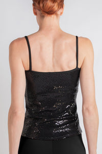 Woman wearing a black sequin cami, back view