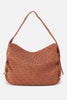 Brown textured handbag on a white background