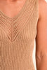 Close-up of a beige knitted sleeveless top on a person.