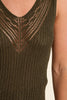 Close-up of a brown knitted sleeveless top with a V-neckline.