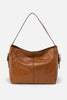 Brown leather handbag on a light gray background with text indicating 'Spring 