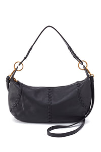 Black handbag with gold accents on a white background