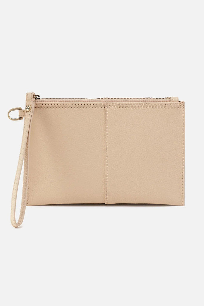 Beige wristlet purse on a light gray background