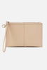 Beige wristlet purse on a light gray background